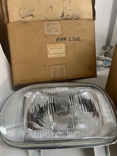 l201 rh head light